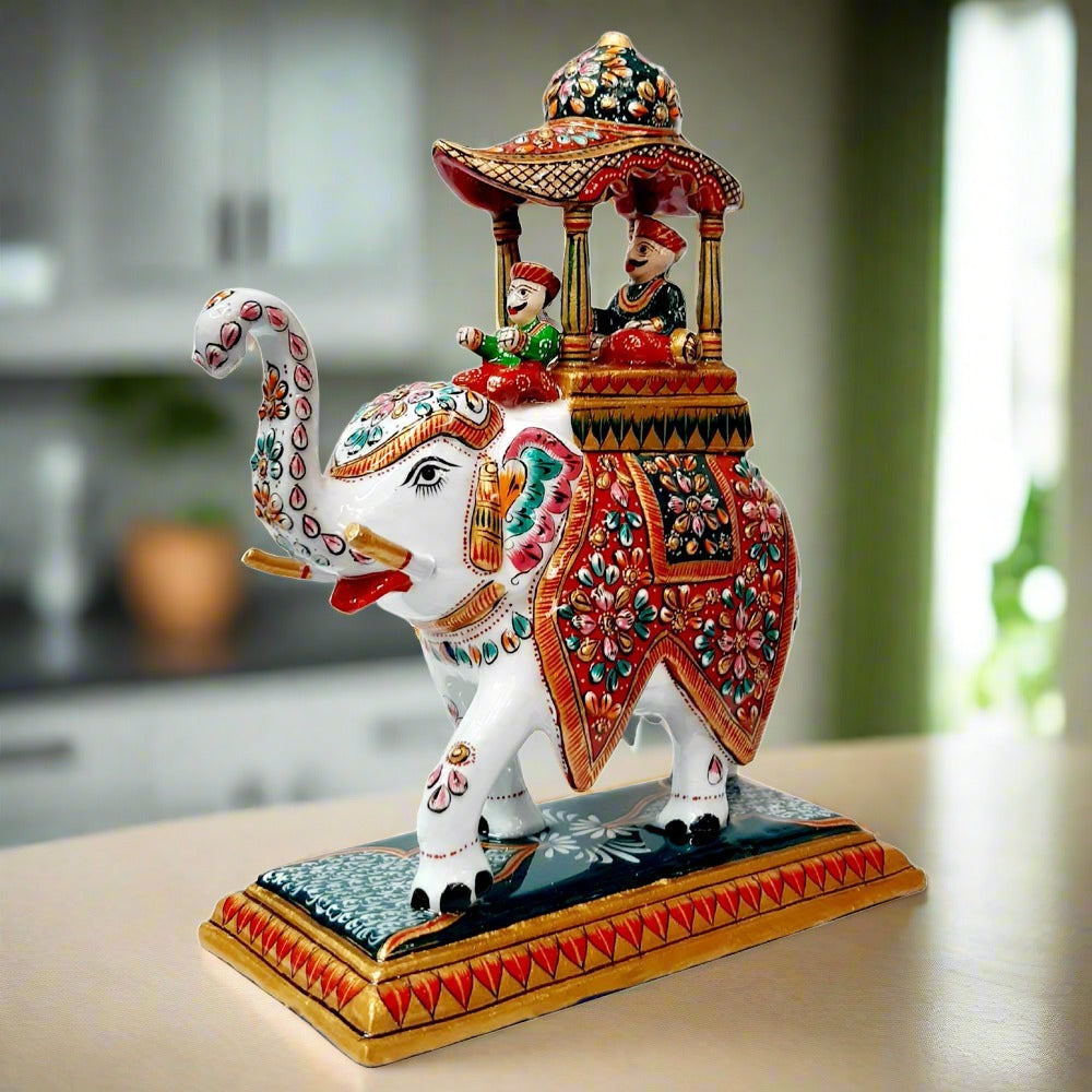 Meenakari-painted metal Ambabari elephant perfect for enhancing living room and office décor with a royal touch.