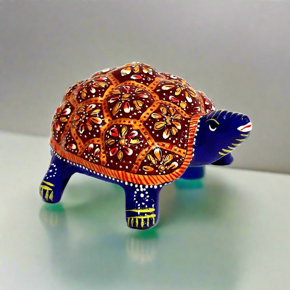 Handcrafted Meenakari metal tortoise Vastu showpiece front view for wealth.