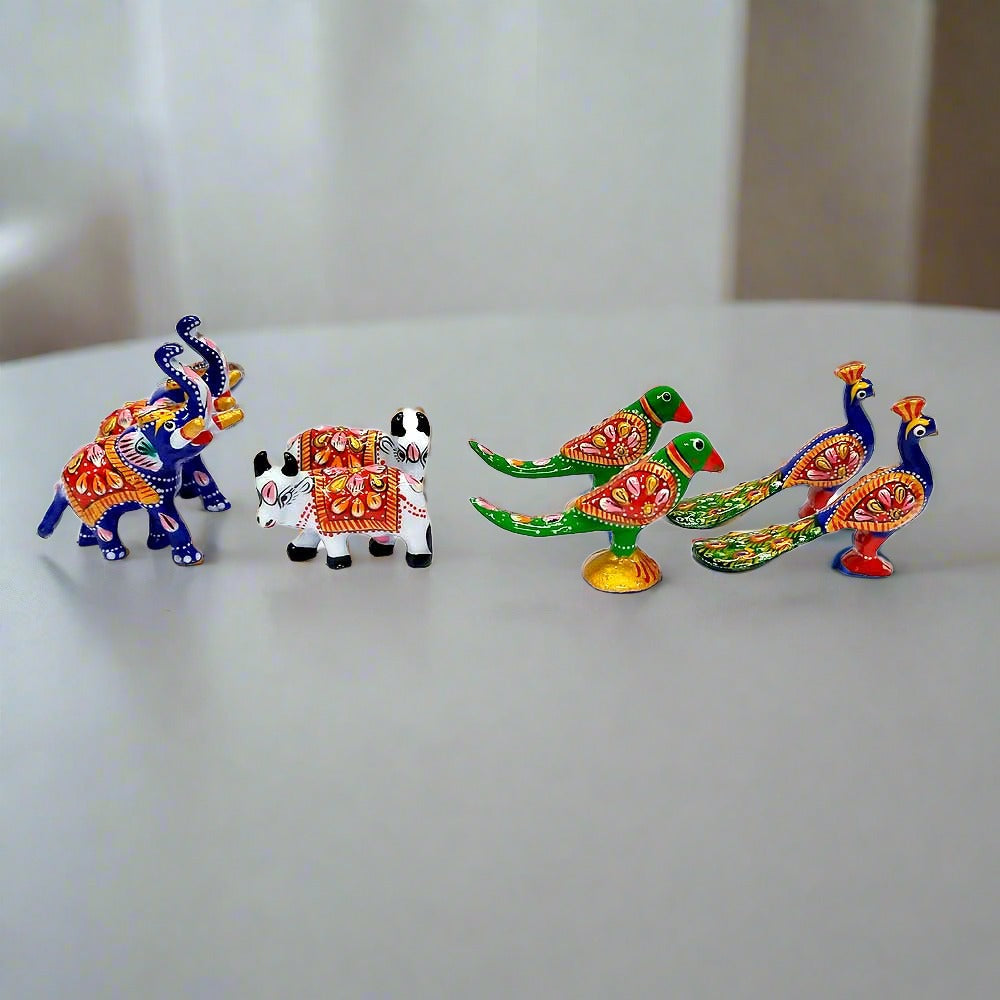 A set of 8 Meenakari metal toys, including elephants, cows, parrots, and peacocks, for Laddu Gopal.