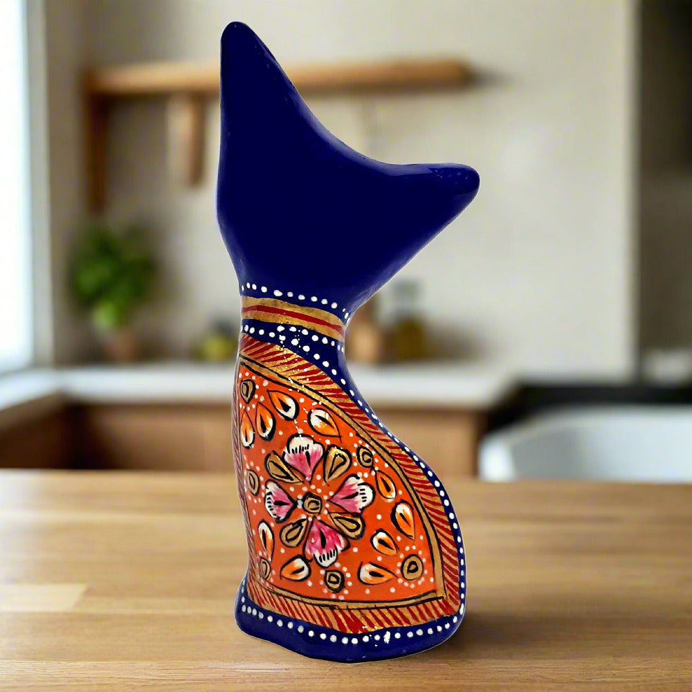 Meenakari painted metal cat showpiece featuring detailed hand painting and beautiful blue color