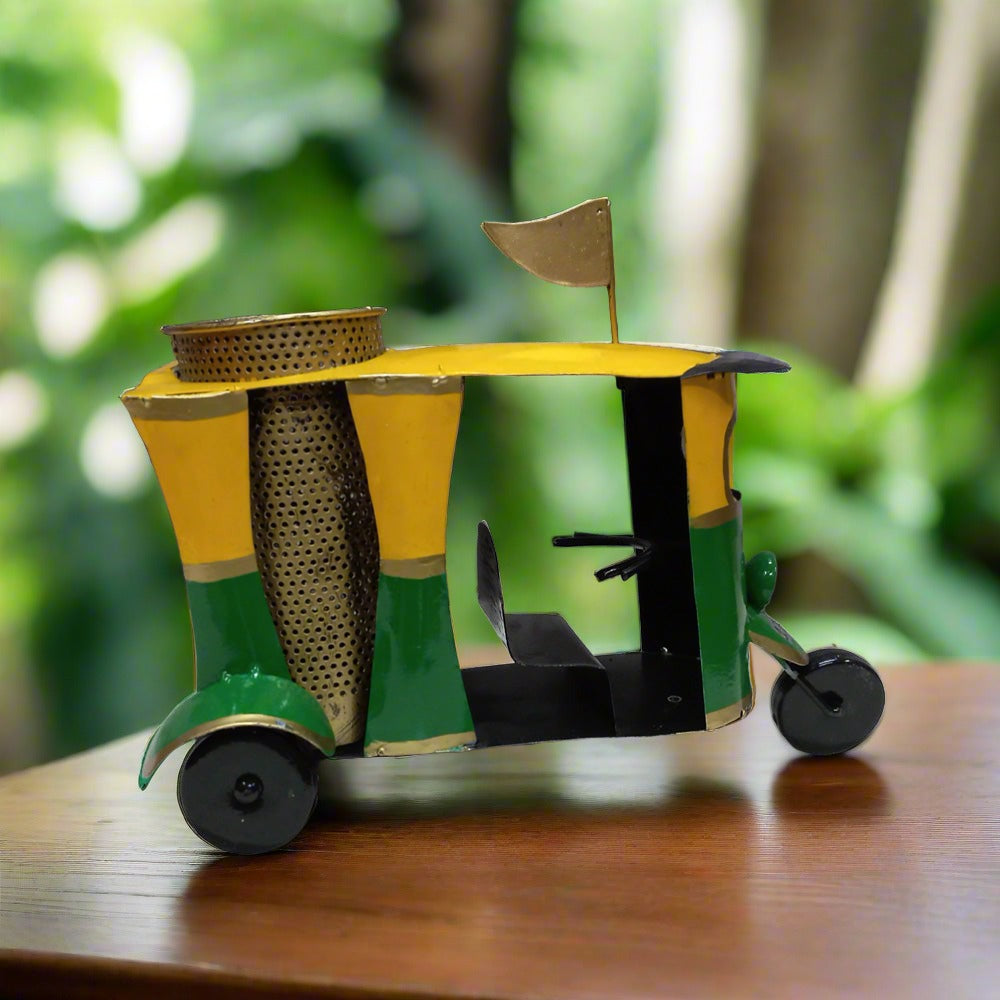 Metal pen stand in traditional auto rickshaw design, perfect for office utility and decorative purposes.