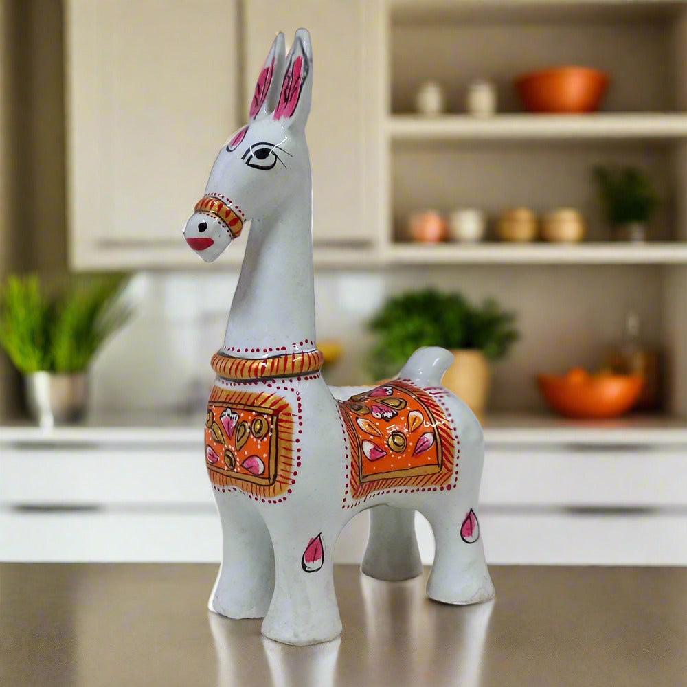 A modern look metal Bankura horse statue decorated with beautiful meena painting.
