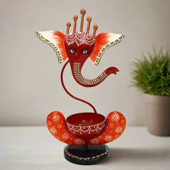 Metal Ganesh tealight candle holder for spiritual home decoration.