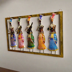 Handcrafted metal wall hanging set depicting Rajasthani musicians with various instruments in vibrant traditional style.