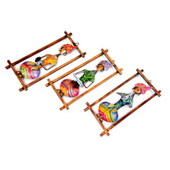 A metal musician showpiece that can be hung on a stair wall or in a room for home decor.