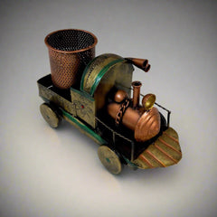 Metal pen holder designed as vintage train with handmade painting, combining functionality and beauty.