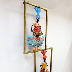 Metal wall art frame depicting Rajasthani musicians with vibrant hand-painted instruments, ideal for home or office decor.