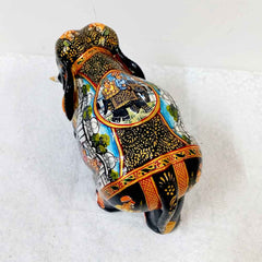 Multicolor Mughal painted wooden elephant with black base, hand-painted with miniature designs on various body parts.