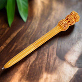 Handmade wooden pen featuring the Ashoka symbol on the top, comes with blue refill, ideal as a memorable gift.