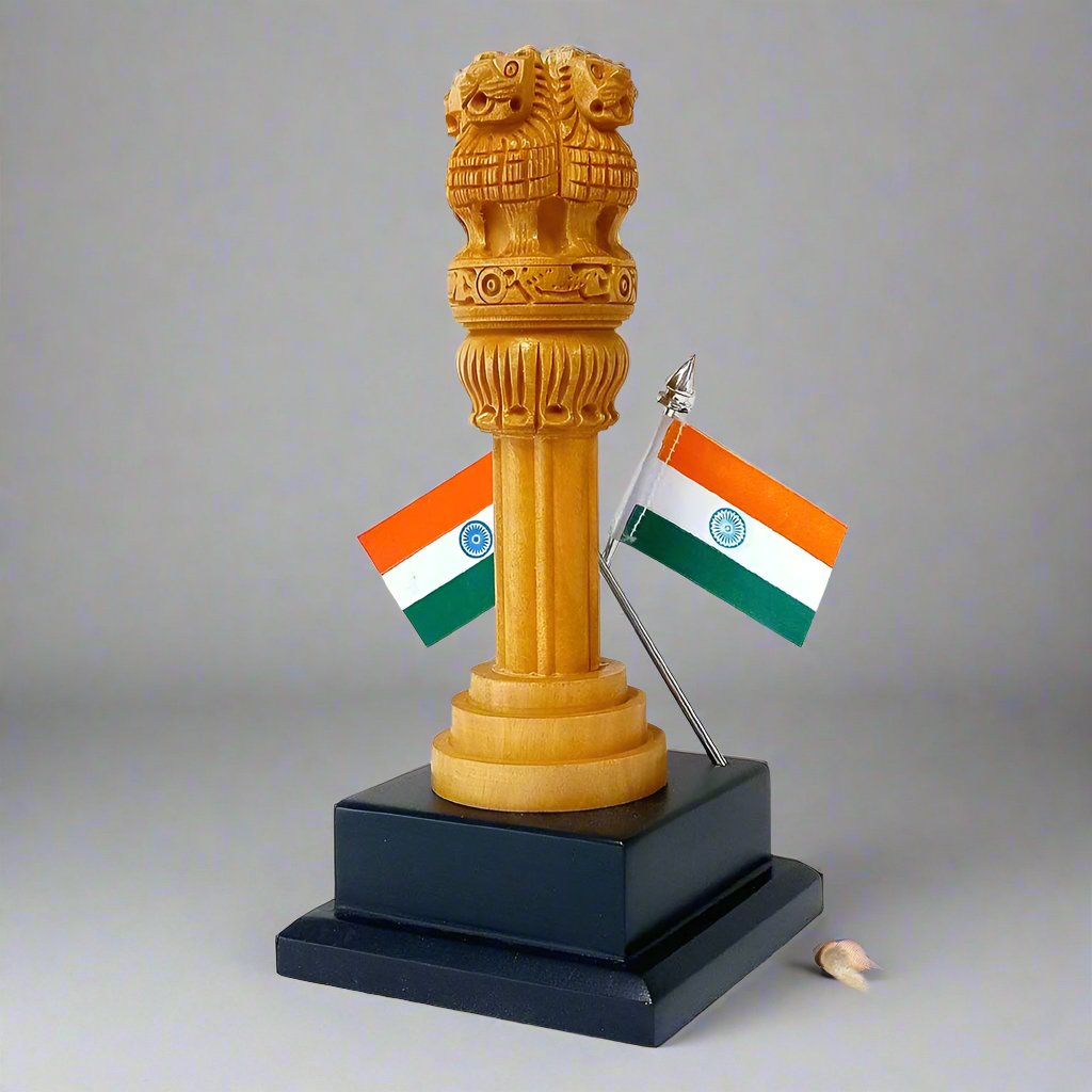 Wooden Ashoka Pillar national emblem with hand-painted details and dual Indian flags display