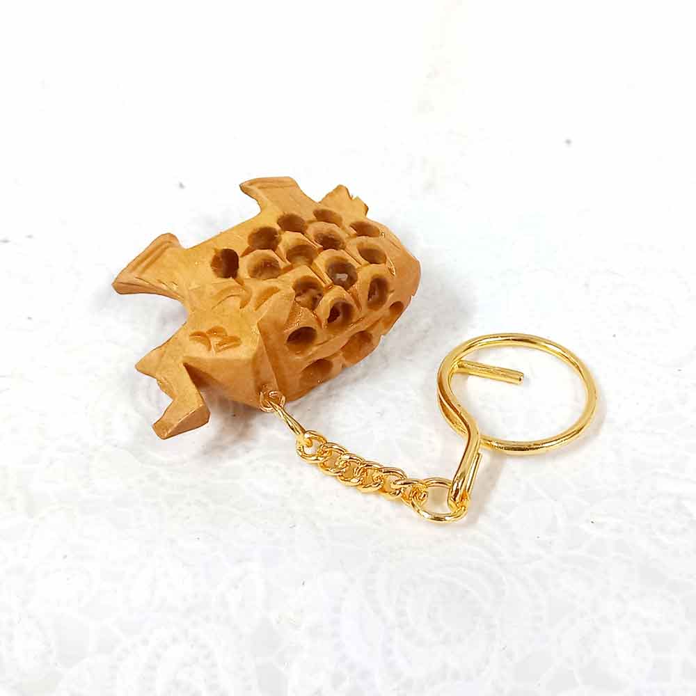 A wooden elephant key fob with a long-lasting golden polish and a good quality metal ring.