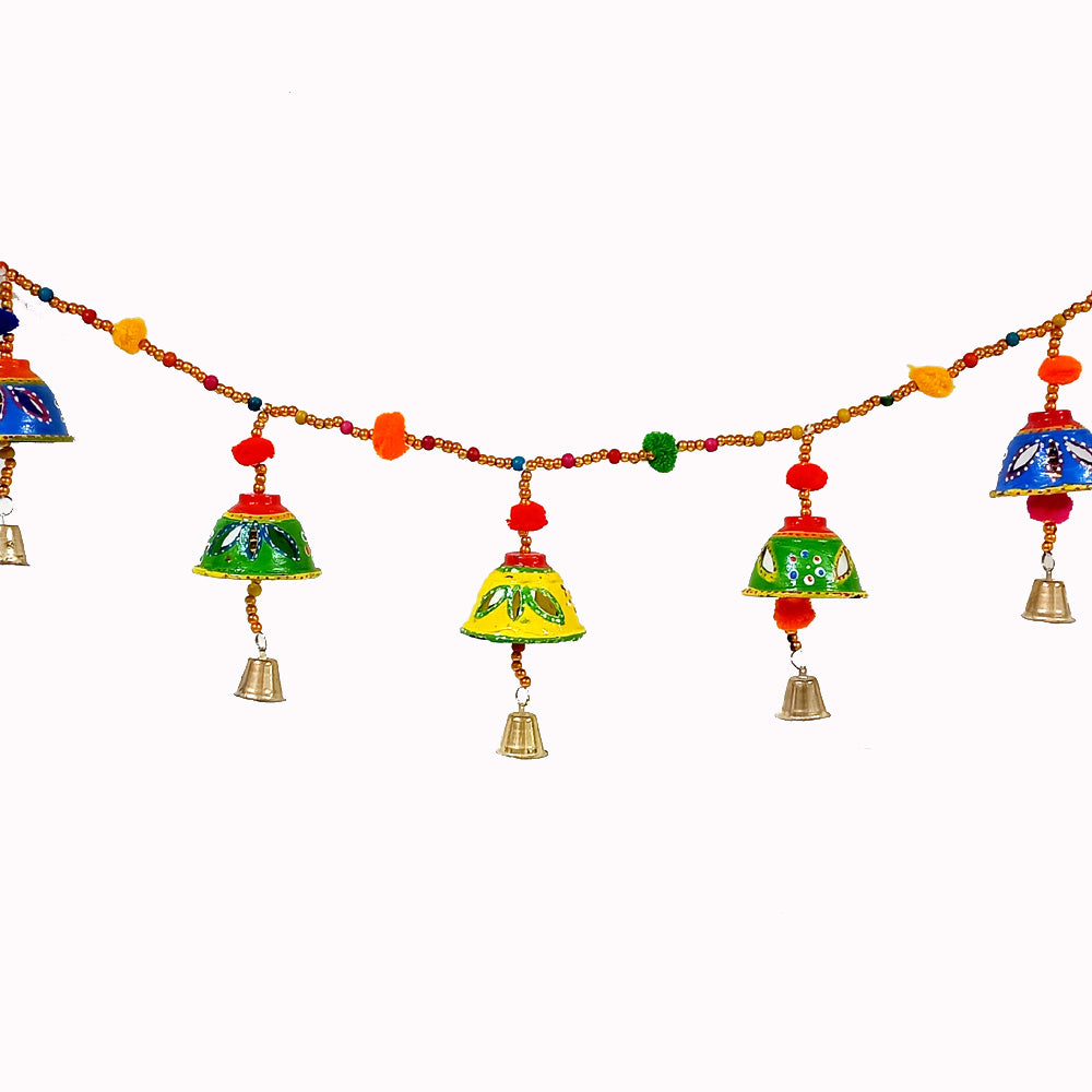 A handmade papermache Bandarwal with cute pom-poms and colorful hand painting.