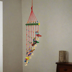 Artistic peacock toran wall hanging crafted in paper mache, perfect as a thoughtful gift.