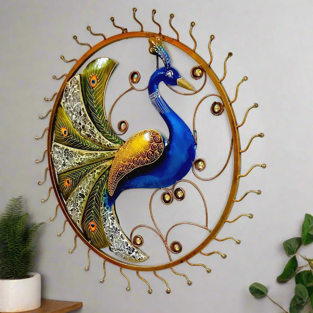 Wall mounted metal peacock frame featuring vibrant hand painting and feather decorations with elegant glass pieces.
