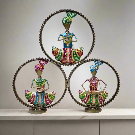 Table-mounted Rajasthani musical set with golden ring design, featuring musicians playing traditional instruments, a decorative showpiece.