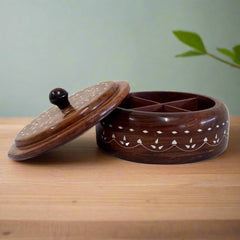 Front view of round Sisam wood spice box with inlay work and four compartments for kitchen spices
