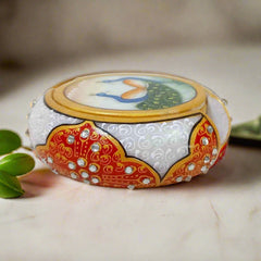 White marble coaster set featuring detailed peacock artwork and emboss-painted holder, ideal for dining or office tables.