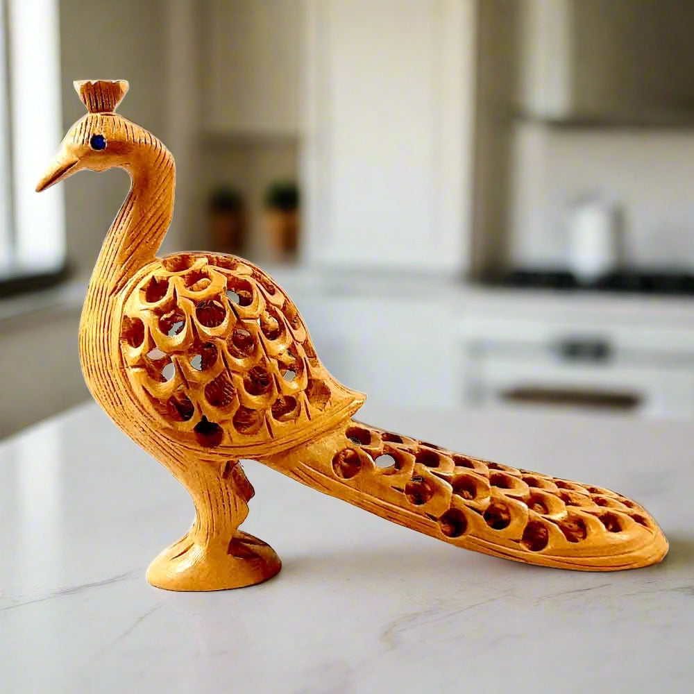 A spectacular wooden peacock showpiece with an elongated shape and fine workmanship.