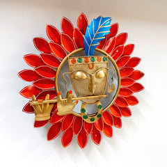 Spiritual metal wall showpiece depicting Kishan ji’s face painted on red double leaves, enhancing temple or home walls.