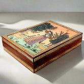 A beautiful teak wood jewellery box with a handmade gemstone painting on a glass base.