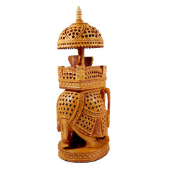 Traditional wooden Ambabari elephant figurine adorning living spaces, symbolizing royal travel with a mahout.