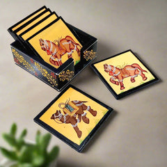 A set of traditional drink coasters with hand-painted animal designs, a great gift for an office desk.