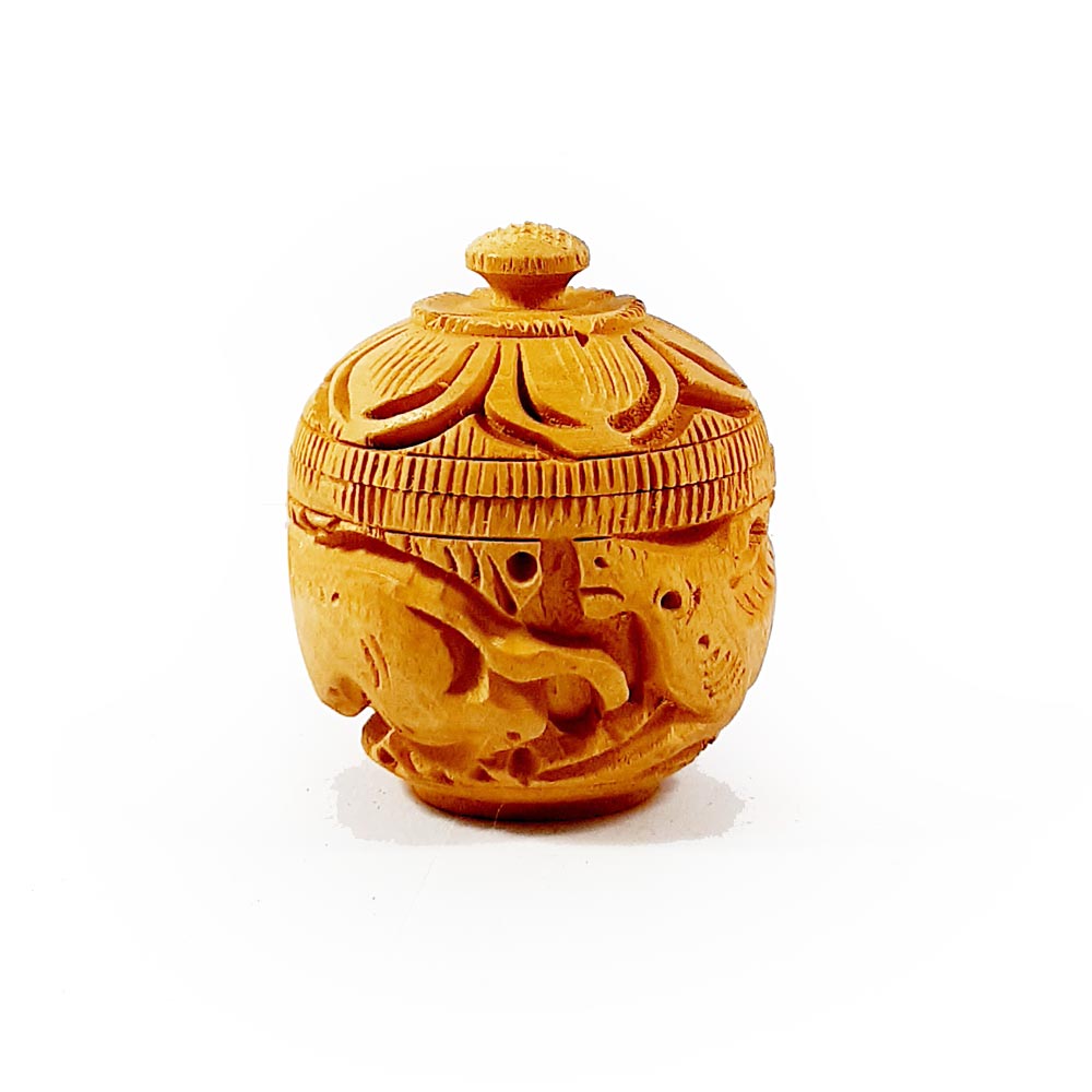 Traditional handcrafted wooden kumkum box featuring fine threading design and perfect for home and ritual use.