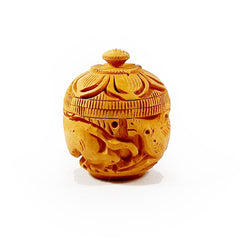 Traditional handcrafted wooden kumkum box featuring fine threading design and perfect for home and ritual use.