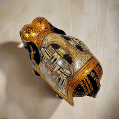 Traditional Kadamba wood elephant with exquisite hand-painted miniatures, perfect for home or office with cultural significance.