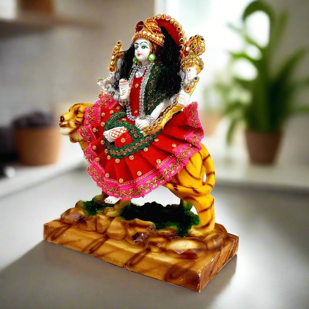 Maa Durga statue placed in home temple for worship and spiritual peace.