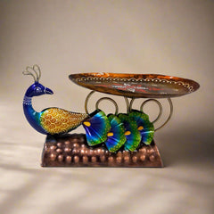 Traditional metal peacock platter with colorful hand-painted design, a striking decorative showpiece.