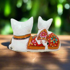 Unique metal animal showpiece featuring a baby cat sitting beside its mother, decorated with enamel paint.