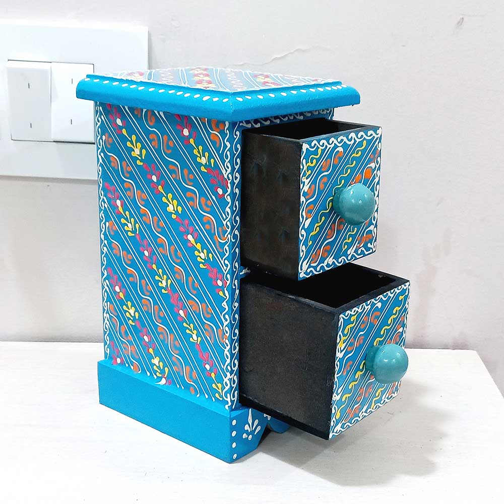 A useful and decorative wooden jewelry box with beautiful hand painting.