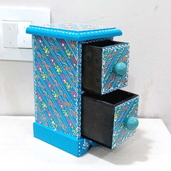 A useful and decorative wooden jewelry box with beautiful hand painting.