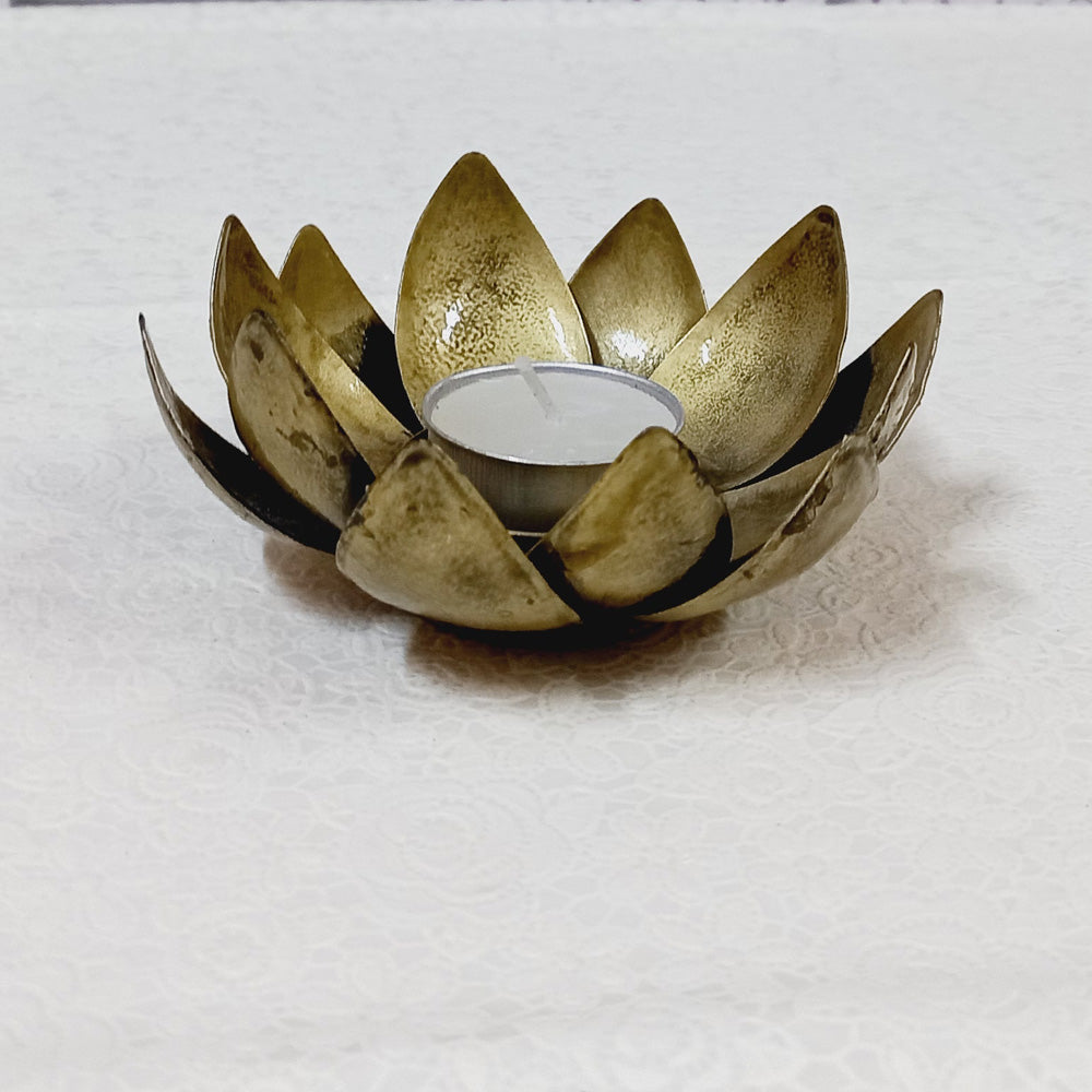 Vibrant metal lotus candle holder with decorative bloom leaves, perfect for home, office, and festive decorations.