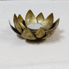Vibrant metal lotus candle holder with decorative bloom leaves, perfect for home, office, and festive decorations.
