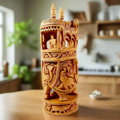 Hand-carved wooden Amabari elephant featuring detailed animal carvings, symbolizing royal rides of king and queen.