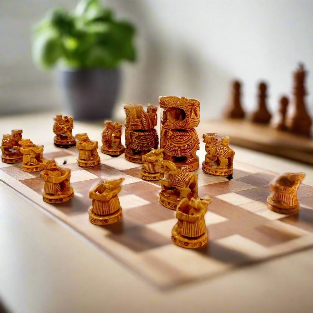 A handcrafted wooden Ambabadi chess set with an elephant design, perfect for adding a royal look to your home.