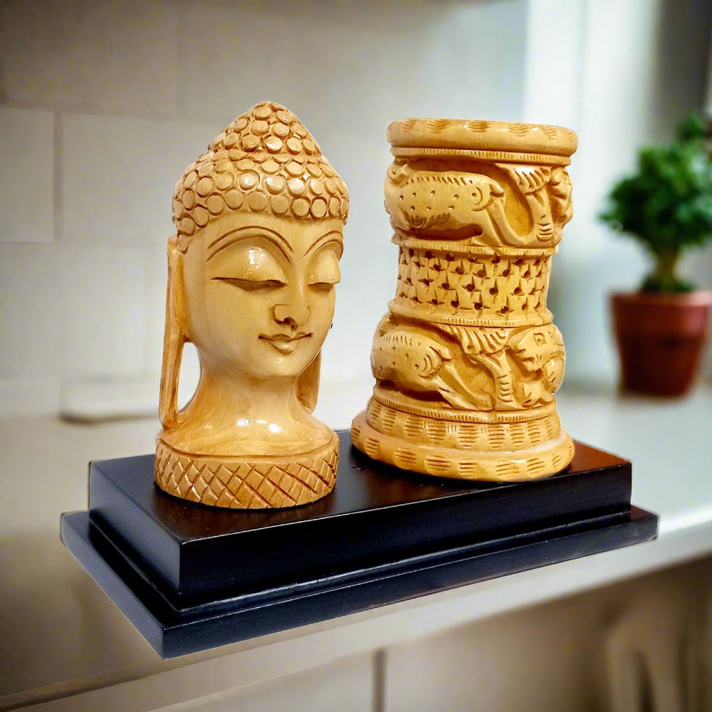 Wooden Buddha pen holder for elegant and spiritual desk decoration.