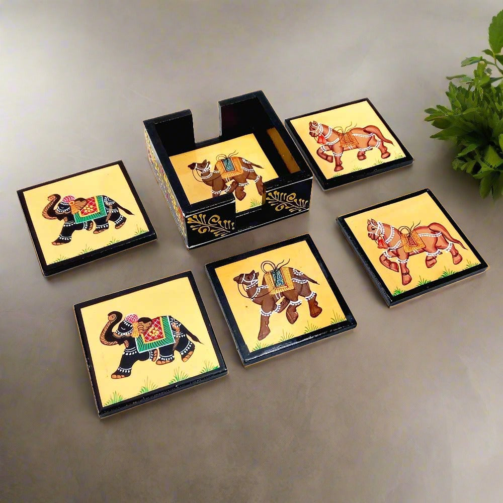 A gorgeous wooden coaster set of 6, with hand-painted elephant, horse, and camel designs.