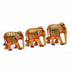 Wooden elephant family showpiece with hand-painted designs.