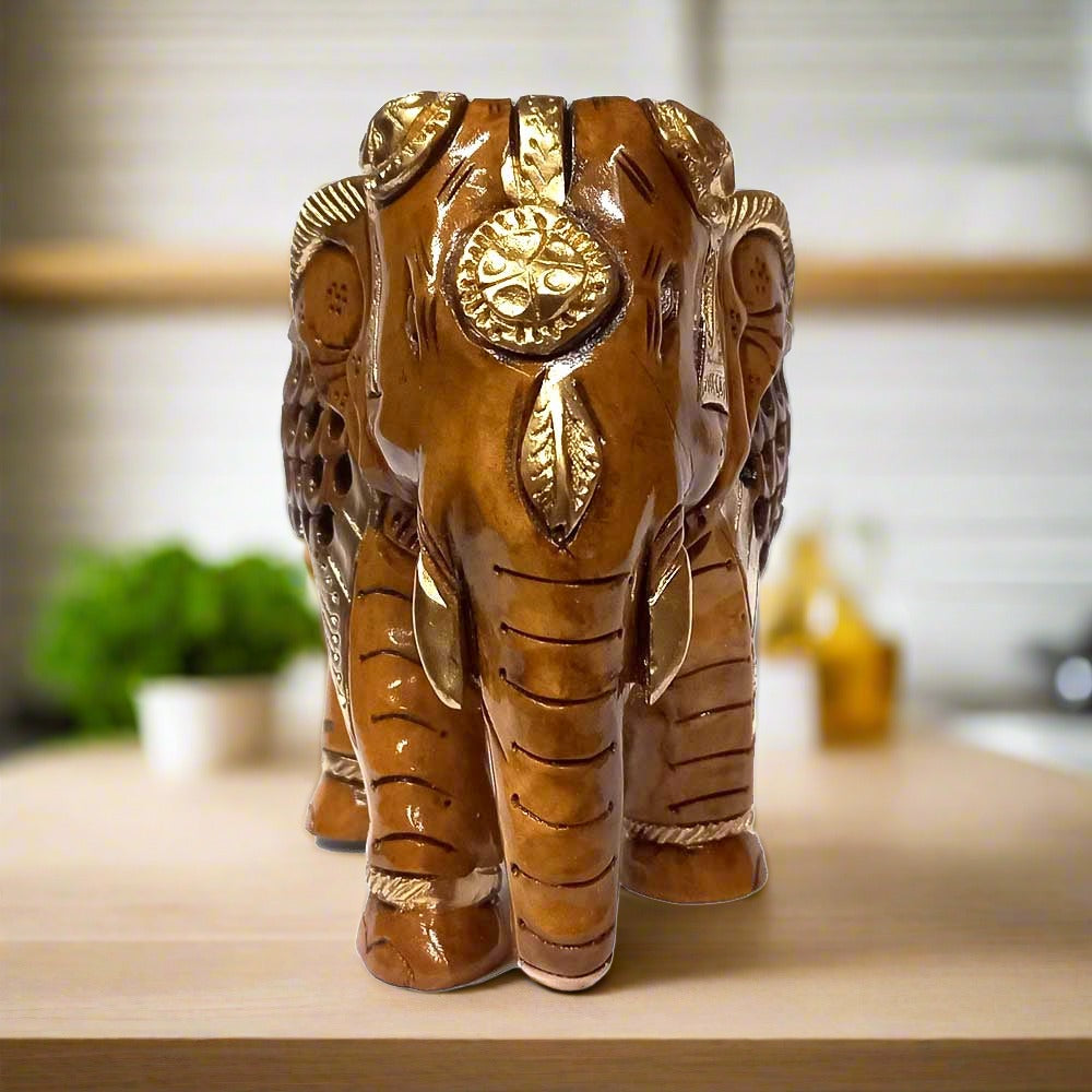 A beautiful wooden elephant showpiece with a detailed Jaali design, perfect for home decor and gifting.