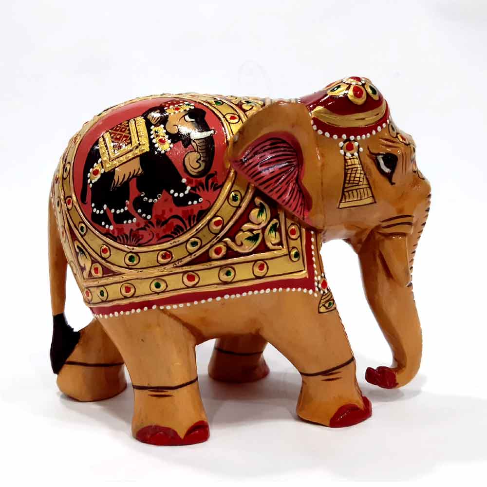 A wooden elephant showpiece, a spectacular piece of tabletop decor.