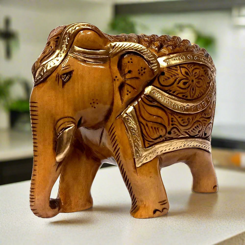 A wooden elephant statue, a perfect and attractive piece for home or office decor.