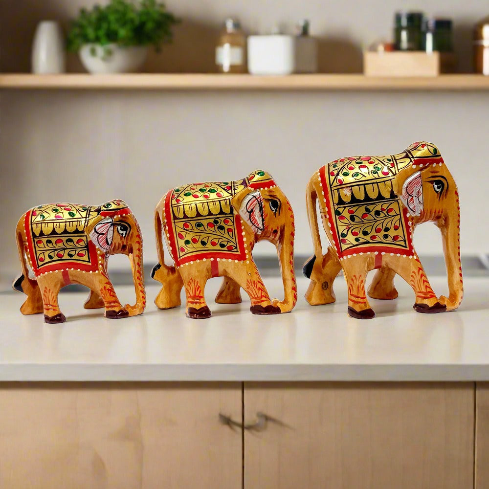 Handmade wooden family elephant set of 3 with colorful hand painting.