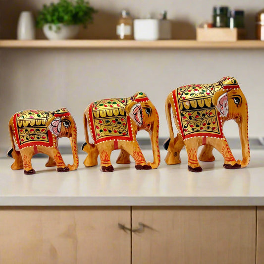 Handmade wooden family elephant set of 3 with colorful hand painting.