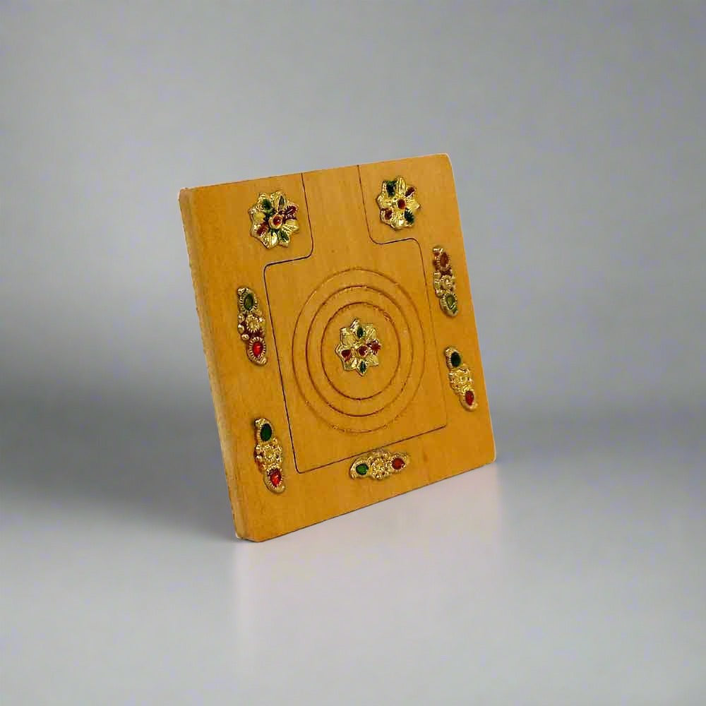 A beautiful wooden pocket mirror decorated with various accessories, perfect for a purse.