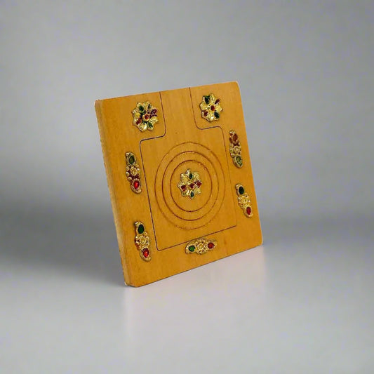 A beautiful wooden pocket mirror decorated with various accessories, perfect for a purse.