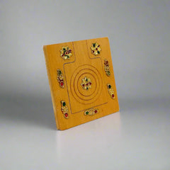 A beautiful wooden pocket mirror decorated with various accessories, perfect for a purse.