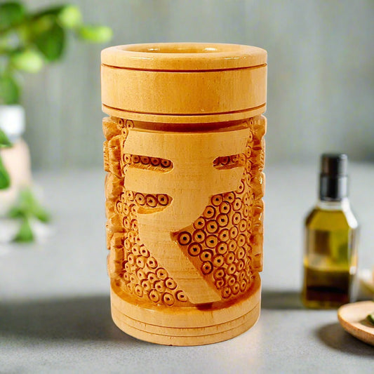 A beautiful wooden pen holder with an engraved Indian rupee symbol, perfect for office gifting.
